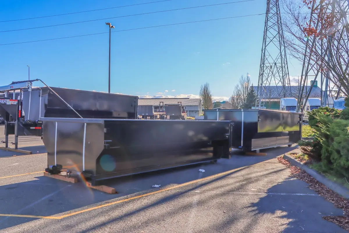 Roll-off dumpster ready for waste disposal at job site for Concrete Dumpster Rental in Sandy